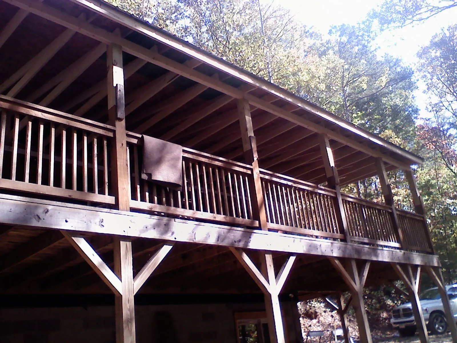 Timber framing under a new elevated porch and deck — Roof Leak Repair in Ardsley On Hudson by Roofing Brothers